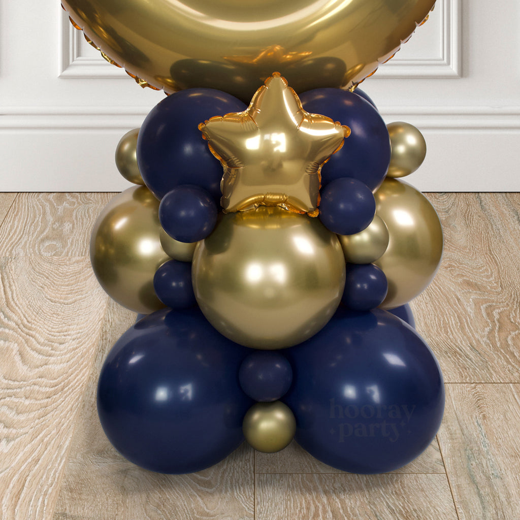 Navy and gold number balloon column